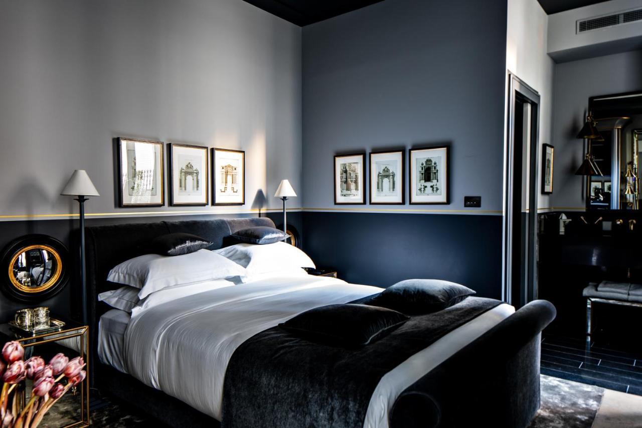 Monsieur George Hotel & Spa - Champs-Elysees باريس المظهر الخارجي الصورة A bedroom at the Hotel